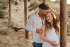 Sesión de embarazo en la playa
